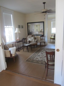 Two adjoining rooms are set up as a salon space in the Rose O'Neill house.